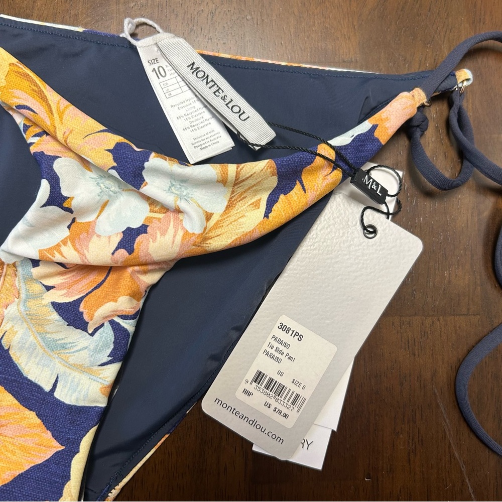 NWT Monte and Lou Paraiso Navy Blue and Orange
Floral String Bikini Set Size 6 - Picture 8 of 16